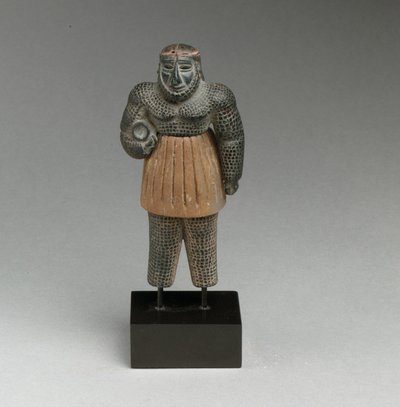 Monstrous male figure by Early Bronze Age